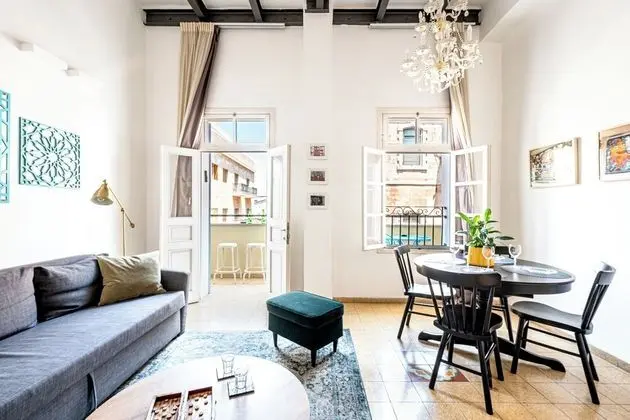 One-Bedroom Apartment with Balcony and City View