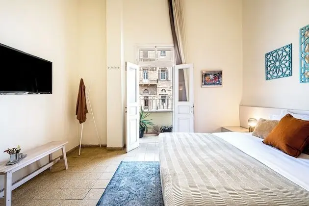 One-Bedroom Apartment with Balcony and City View