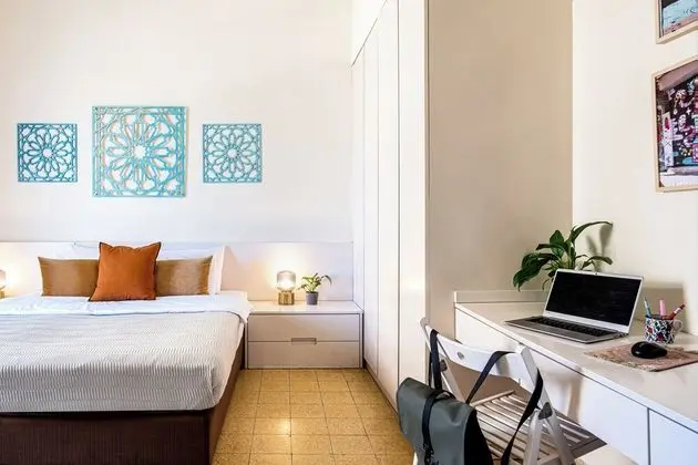 One-Bedroom Apartment with Balcony and City View