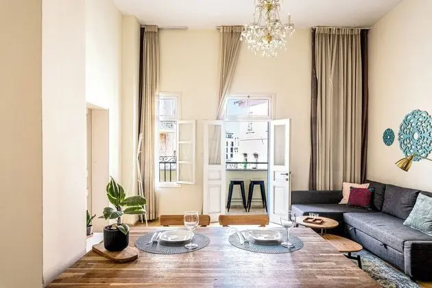One-Bedroom Apartment with Balcony and City View