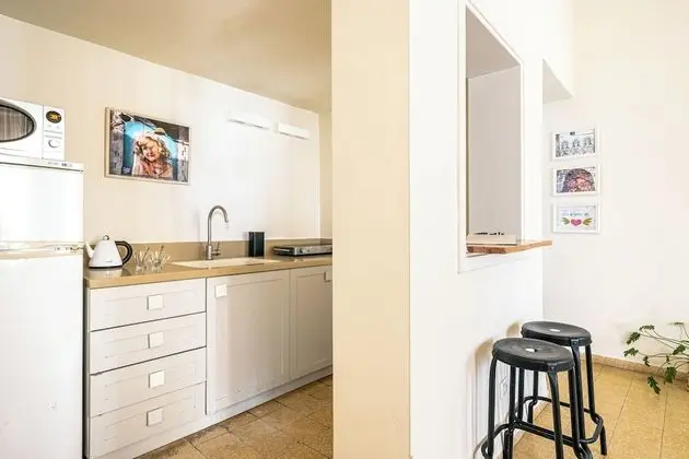 One-Bedroom Apartment with Balcony and City View