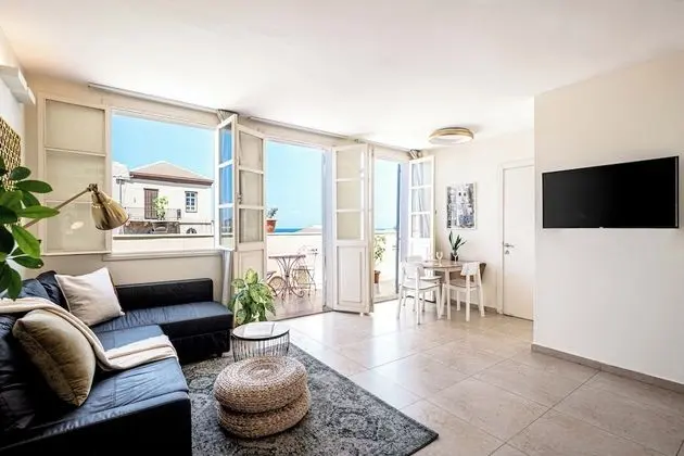 One-Bedroom Apartment with Balcony and City View