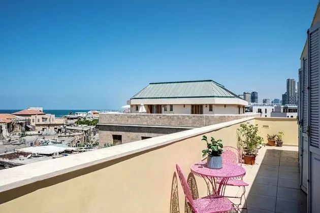 One-Bedroom Apartment with Balcony and City View