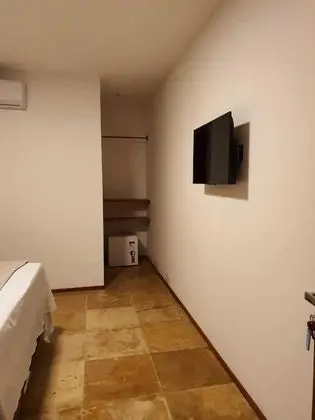 Suite com vista jardim