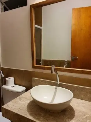 Suite com vista jardim