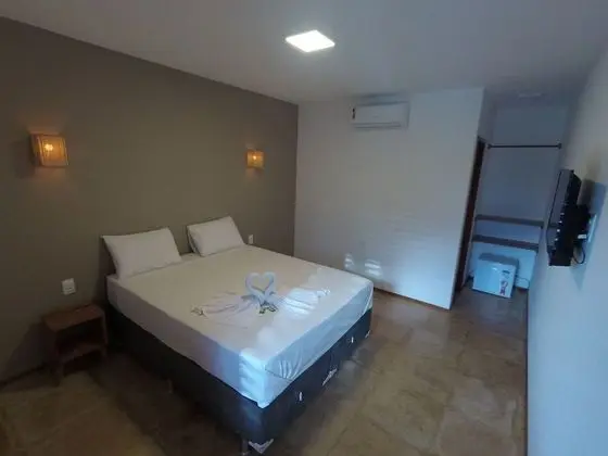 Suite com vista piscina