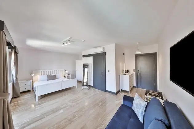Deluxe Triple Room, Bahçe Manzaralı, 2. Kat Balkonlu