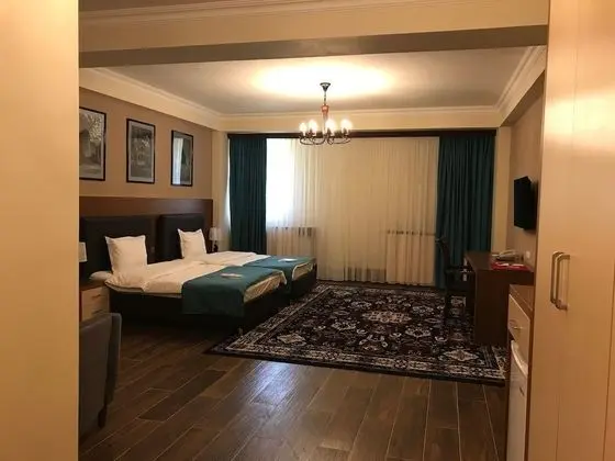 Classic Tek Büyük veya İki Ayrı Yataklı Oda