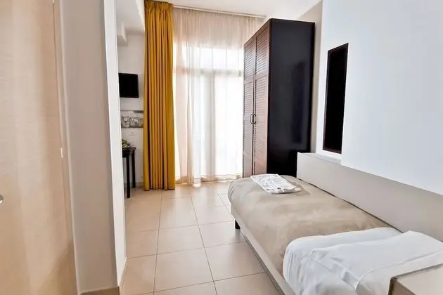 Basic Tek Büyük veya İki Ayrı Yataklı Oda