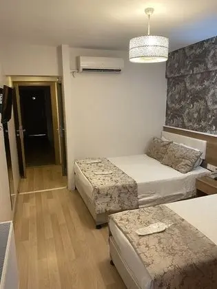 Tek Büyük veya İki Ayrı Yataklı Oda