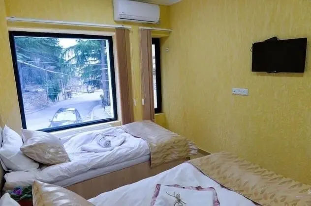 Comfort Tek Büyük veya İki Ayrı Yataklı Oda