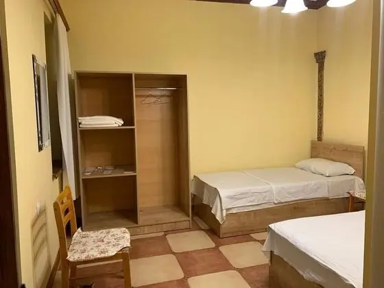 Deluxe Tek Büyük veya İki Ayrı Yataklı Oda