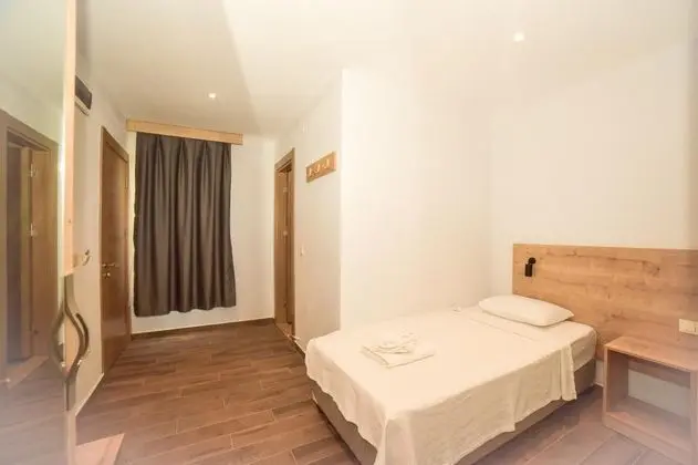 Deluxe Aile Odası, Deniz veya Bahçe Manzaralı, Balkonlu