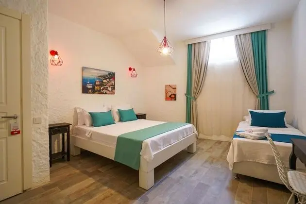 Ekonomik Üç Kişilik Oda,Sokak Manzaralı,Bodrum Kat