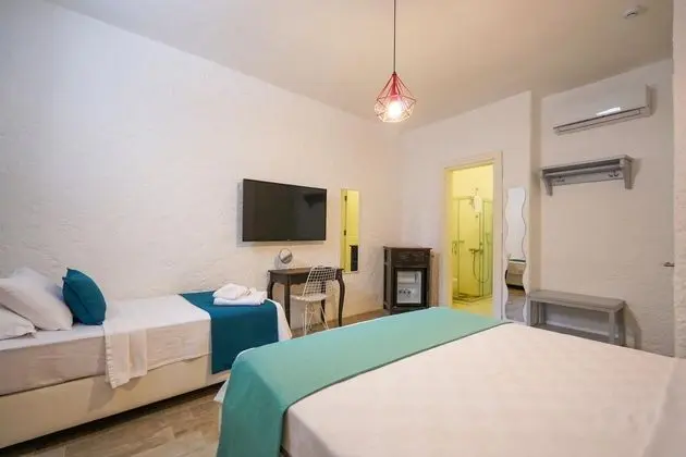 Ekonomik Üç Kişilik Oda,Sokak Manzaralı,Bodrum Kat
