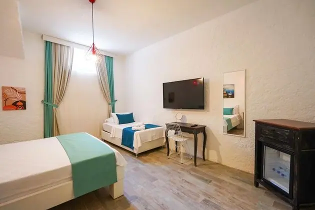 Ekonomik Üç Kişilik Oda,Sokak Manzaralı,Bodrum Kat