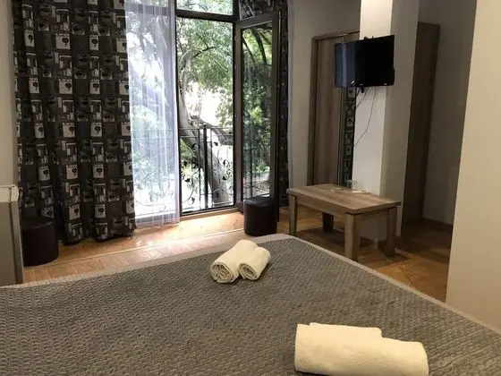 Deluxe Tek Büyük veya İki Ayrı Yataklı Oda