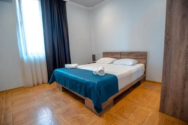 Deluxe Tek Büyük veya İki Ayrı Yataklı Oda