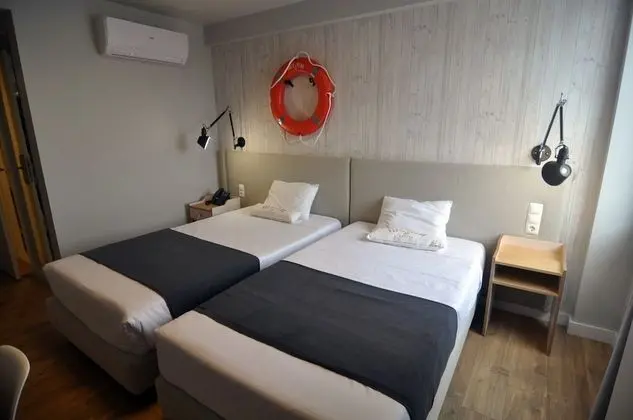 Basic Tek Büyük veya İki Ayrı Yataklı Oda