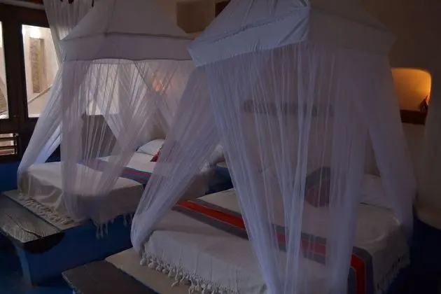 Room with Partial Ocean View two double beds (TWIN)