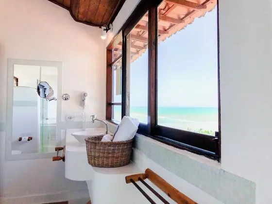 Quarto Deluxe, banheira de hidromassagem interna