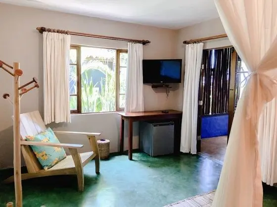 Quarto Deluxe vista parcial para o mar