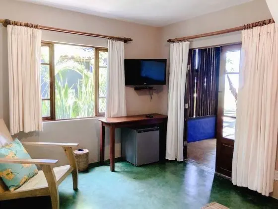 Quarto Deluxe vista parcial para o mar