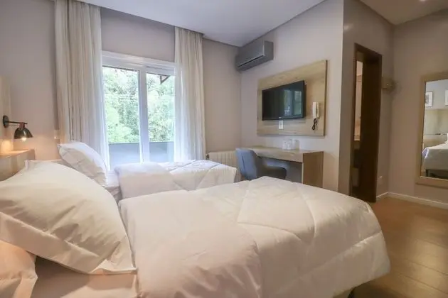 Deluxe Tek Büyük veya İki Ayrı Yataklı Oda
