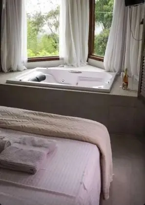 Deluxe Tek Büyük veya İki Ayrı Yataklı Oda