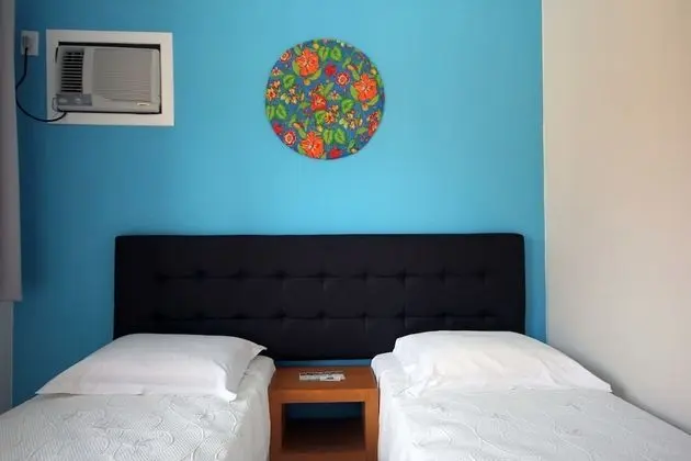 Suíte conjugada (2 quartos e 1 banheiro) quádrupla
