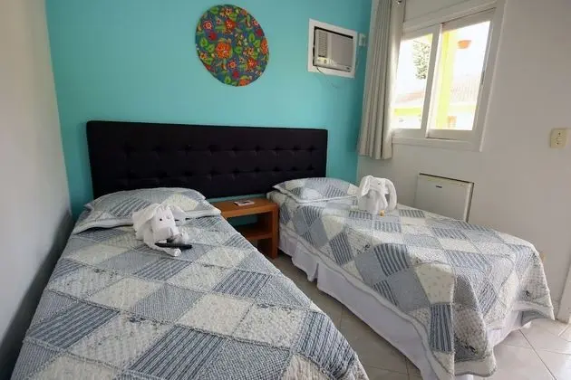 Suíte conjugada (2 quartos e 1 banheiro) quádrupla