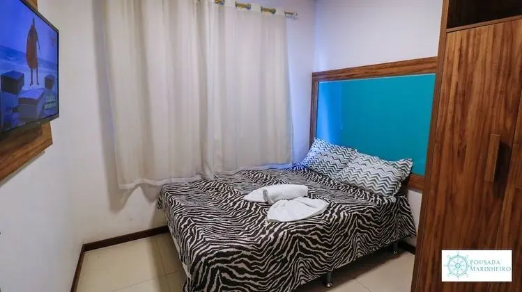 Quarto duplo standard com banheiro compartilhado