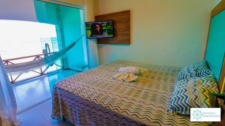 Quarto standard mar com banheiro compartilhado