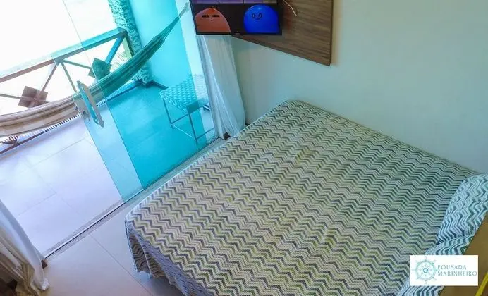 Quarto standard mar com banheiro compartilhado