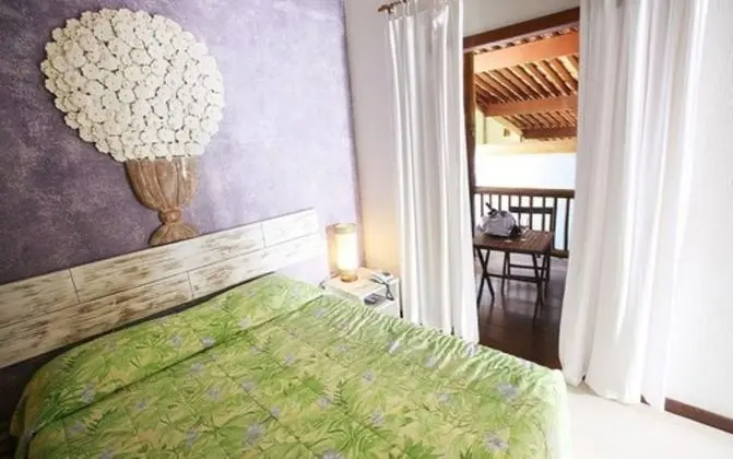 QUARTO DUPLO COM VARANDA