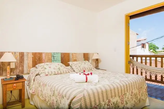 QUARTO DUPLO COM VARANDA