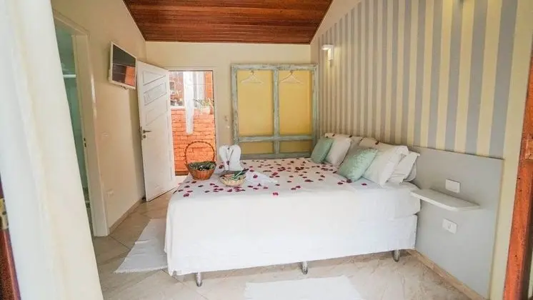 Tek Büyük veya İki Ayrı Yataklı Oda, Balkon, Bahçe Manzaralı