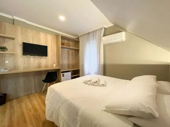 Deluxe Tek Büyük veya İki Ayrı Yataklı Oda