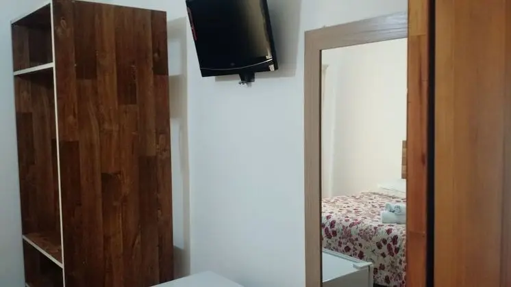 Üç Kişilik Oda