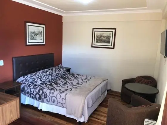 Quarto casal com banheira de hidromassagem (somente Adultos)