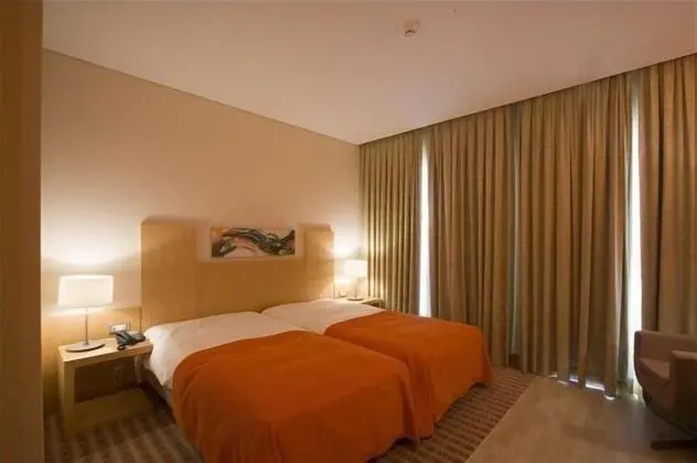 Basic Tek Büyük veya İki Ayrı Yataklı Oda