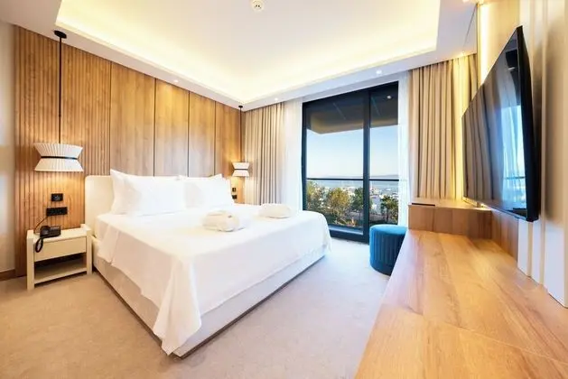 Deluxe Tek Büyük Yataklı Oda, Balkon, Deniz Manzaralı