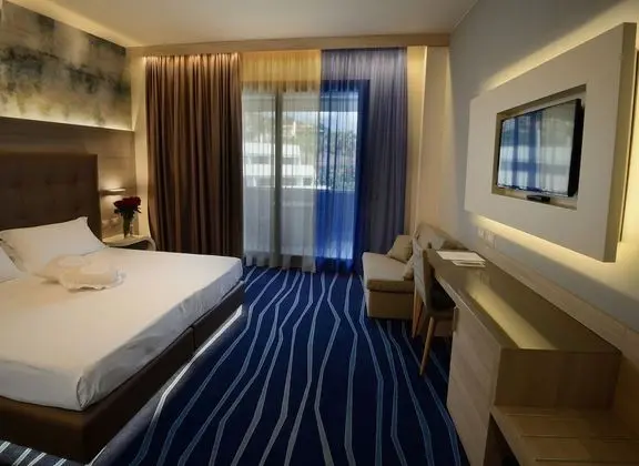 Deluxe Tek Büyük veya İki Ayrı Yataklı Oda, Balkon
