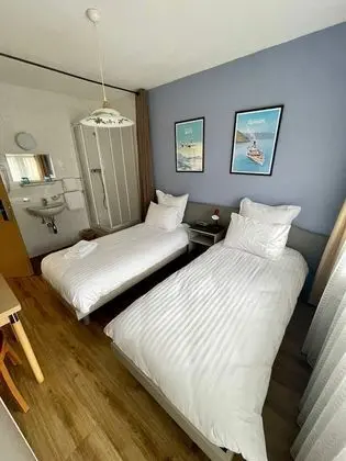 Economy Tek Büyük veya İki Ayrı Yataklı Oda, Ortak Banyo (Moyen Budget)