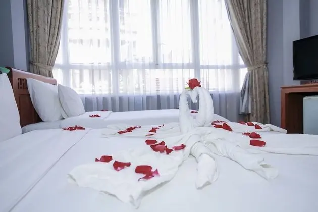 Deluxe Tek Büyük veya İki Ayrı Yataklı Oda