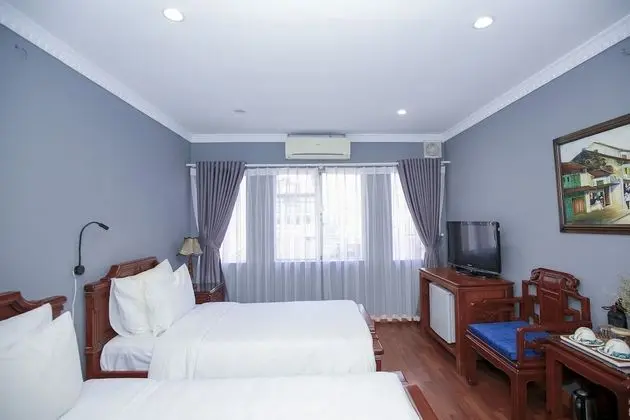 Deluxe Tek Büyük veya İki Ayrı Yataklı Oda