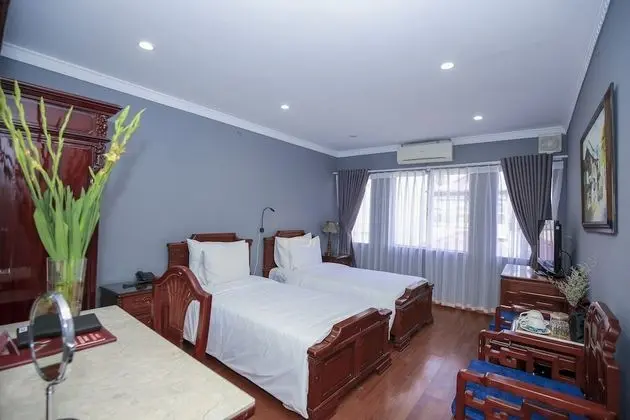 Deluxe Tek Büyük veya İki Ayrı Yataklı Oda