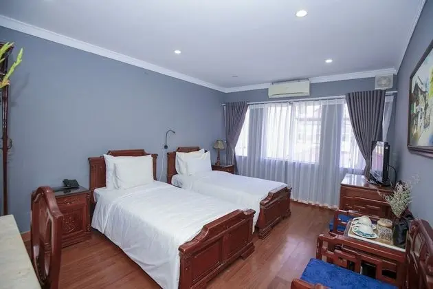 Deluxe Tek Büyük veya İki Ayrı Yataklı Oda