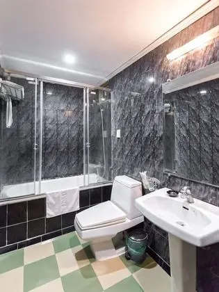 Deluxe Tek Büyük veya İki Ayrı Yataklı Oda