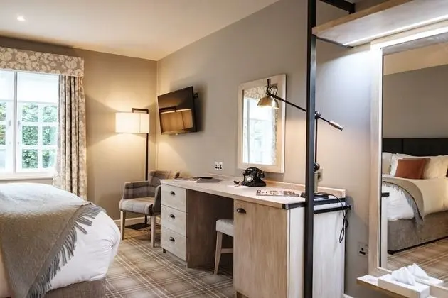 Deluxe Tek Büyük veya İki Ayrı Yataklı Oda (Shower)